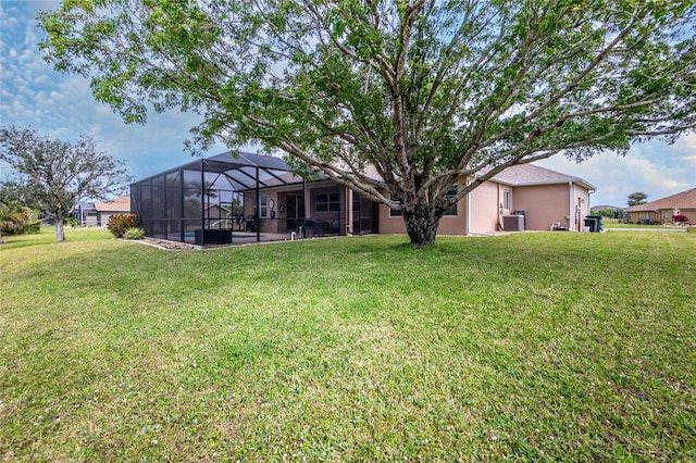 view of yard with a lanai