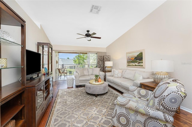 living room with ceiling fan, high vaulted ceiling, wood finished floors, and visible vents