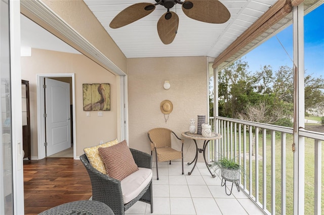 balcony featuring a ceiling fan