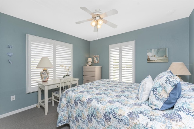 bedroom with ceiling fan, carpet floors, and baseboards