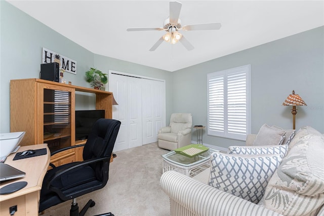 home office featuring carpet floors and ceiling fan