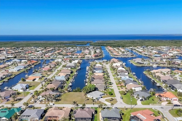 aerial view featuring a residential view and a water view