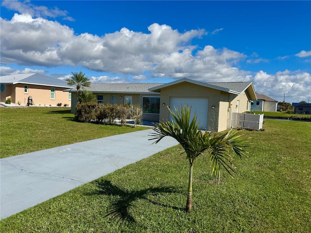 ranch-style home featuring a garage, concrete driveway, a front yard, and stucco siding