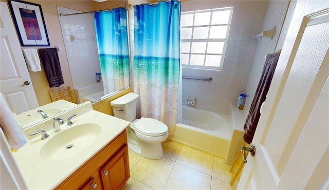 bathroom featuring toilet, shower / bath combo with shower curtain, vanity, and tile patterned floors