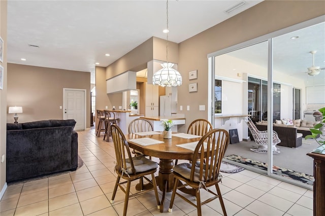 dining area featuring light tile patterned floors, recessed lighting, visible vents, and a ceiling fan