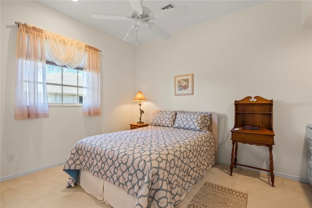 bedroom featuring a ceiling fan, baseboards, visible vents, and carpet flooring