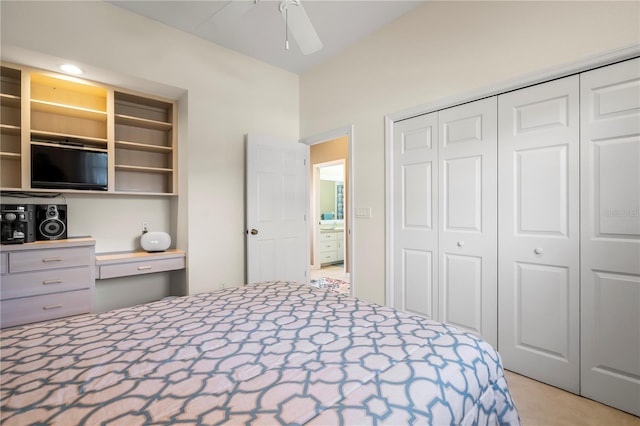 unfurnished bedroom featuring a ceiling fan, a closet, and built in study area