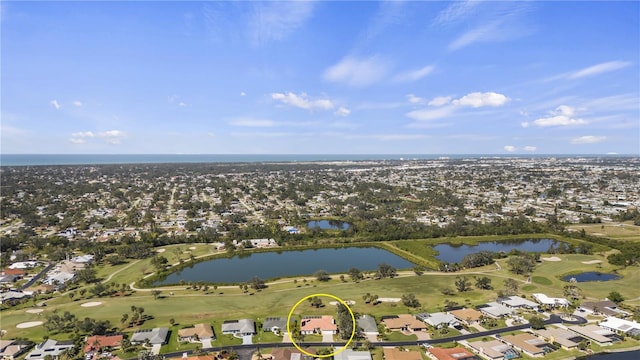 bird's eye view featuring a residential view, a water view, and golf course view