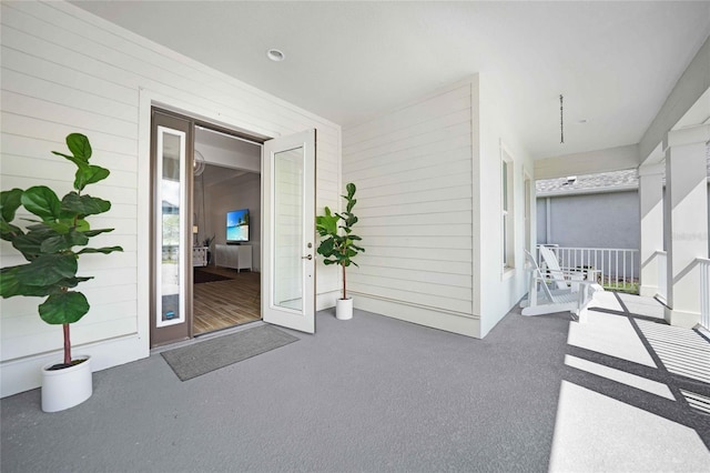 42239 Lake Timber Dr, Punta Gorda, FL 33982 - doorway to property featuring a porch