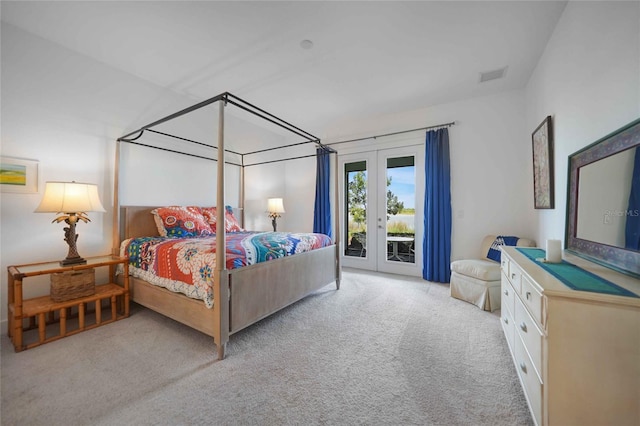 42239 Lake Timber Dr, Punta Gorda, FL 33982 - bedroom featuring access to exterior, carpet, visible vents, and french doors