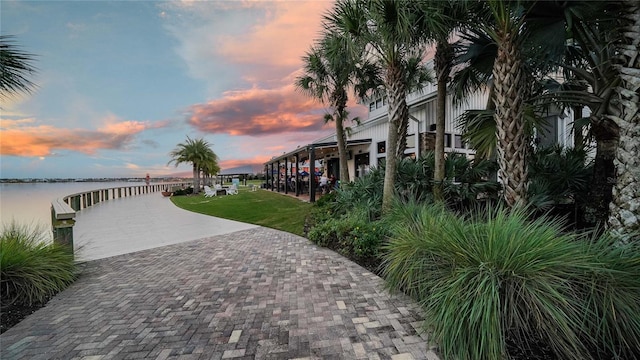 42239 Lake Timber Dr, Punta Gorda, FL 33982 - view of property's community with a yard and a water view