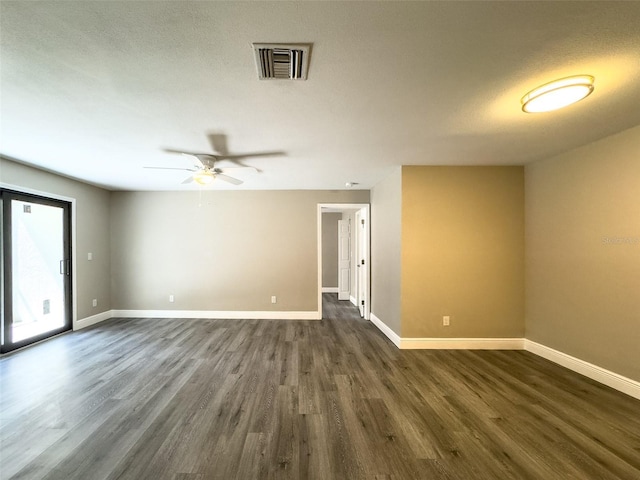 17426 Birchwood Ln Unit 3, Fort Myers, FL 33908 - unfurnished room with dark wood finished floors, baseboards, and a ceiling fan