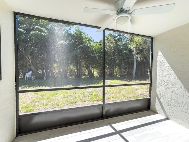 17426 Birchwood Ln Unit 3, Fort Myers, FL 33908 - unfurnished sunroom with ceiling fan and plenty of natural light