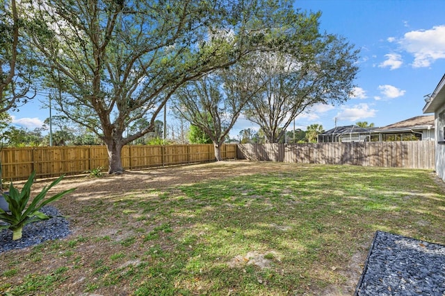 view of yard featuring a fenced backyard