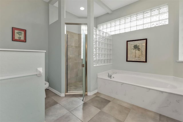 full bathroom with toilet, a shower stall, tile patterned flooring, baseboards, and a bath