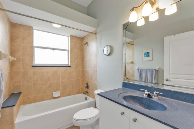 bathroom with shower / washtub combination, vanity, and toilet