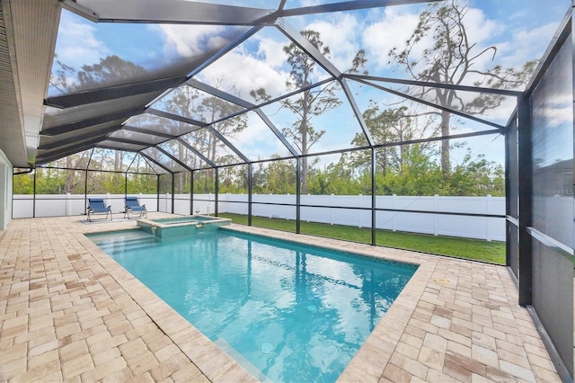 14325 Mcfarland Ave, Port Charlotte, FL 33981 - view of pool with a patio area, a pool with connected hot tub, a lanai, and fence