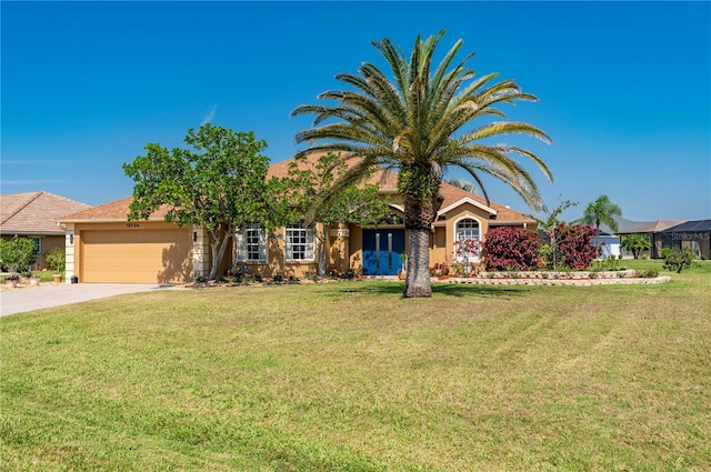 view of front of property with a garage, concrete driveway, a front lawn, and stucco siding