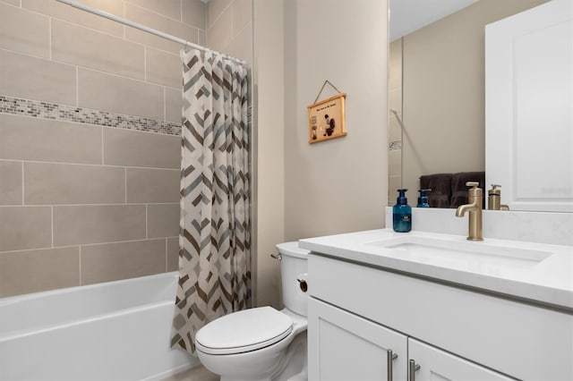 bathroom with vanity, toilet, and shower / tub combo with curtain