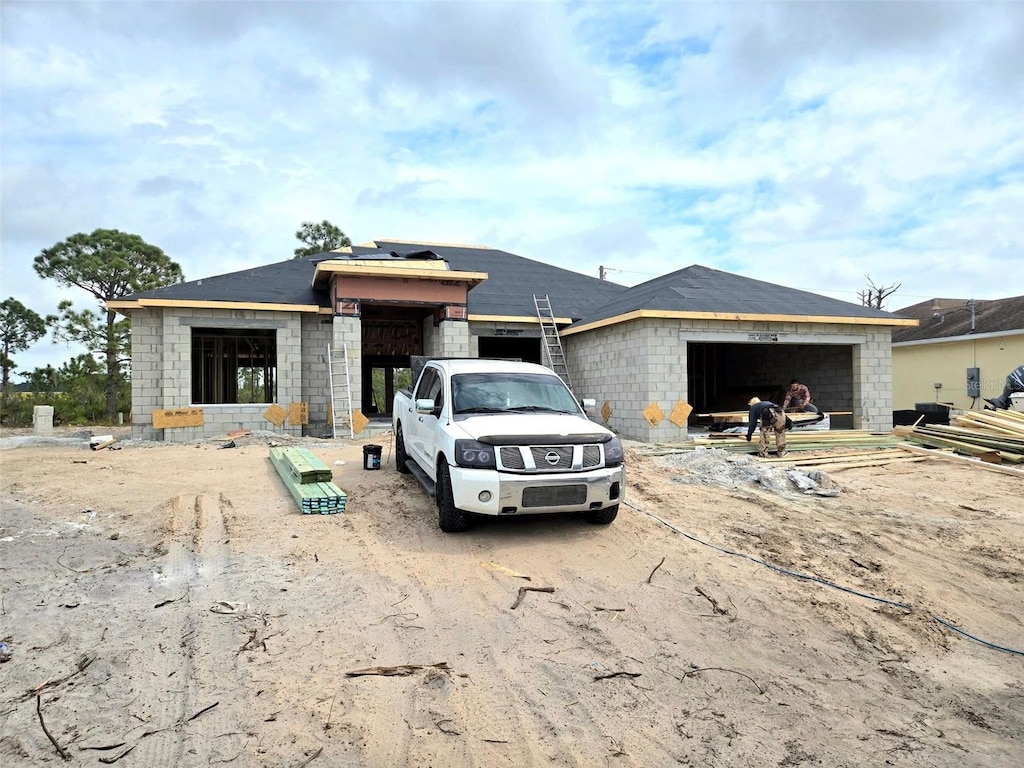 property under construction featuring a garage