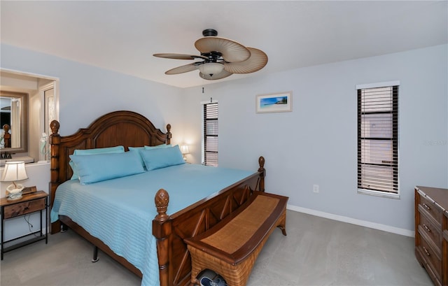 bedroom featuring ceiling fan and baseboards