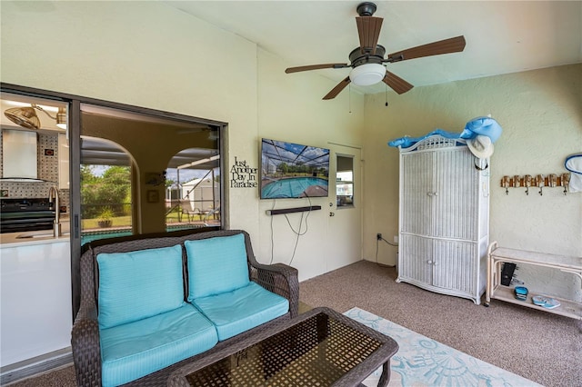 view of patio featuring a ceiling fan and a sink