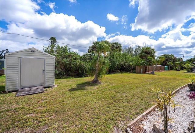 view of yard with a storage unit and an outdoor structure