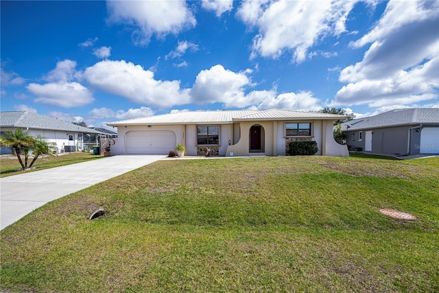 ranch-style house featuring driveway, a front yard, an attached garage, and stucco siding