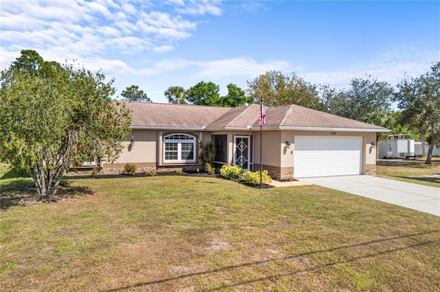 single story home with a garage, concrete driveway, a front lawn, and stucco siding