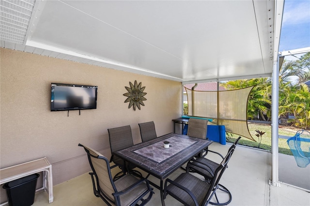 view of patio featuring outdoor dining area