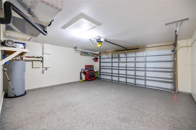 garage featuring baseboards, electric water heater, and a garage door opener