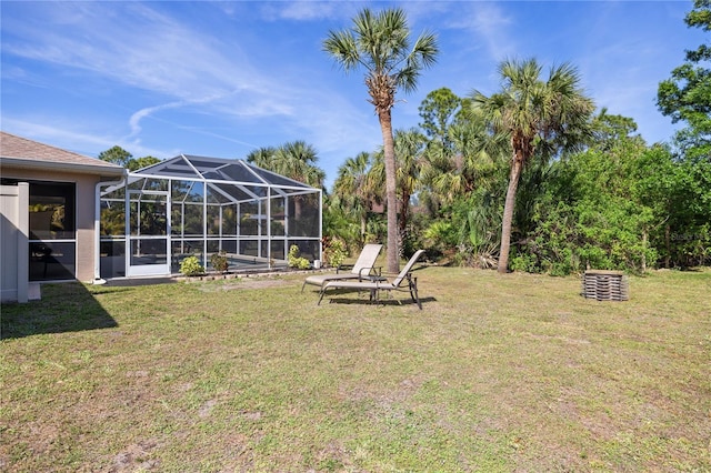 view of yard featuring a lanai