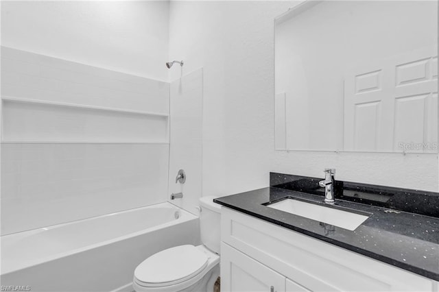 full bathroom featuring bathing tub / shower combination, toilet, and vanity