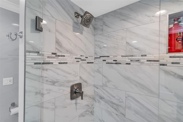 full bath featuring a tile shower