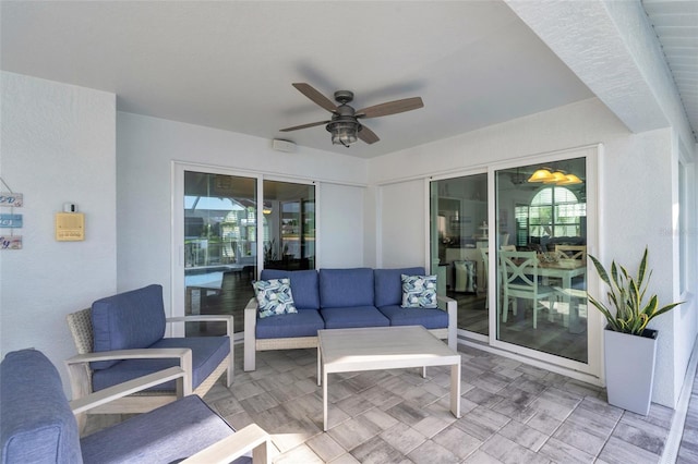 view of patio featuring ceiling fan and an outdoor hangout area