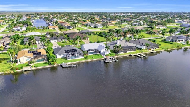 aerial view with a water view and a residential view