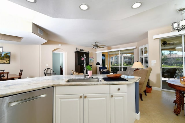 kitchen with visible vents, dishwasher, ceiling fan, white cabinetry, and a sink