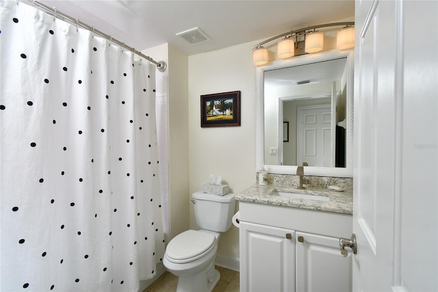 bathroom featuring toilet, a shower with curtain, visible vents, and vanity