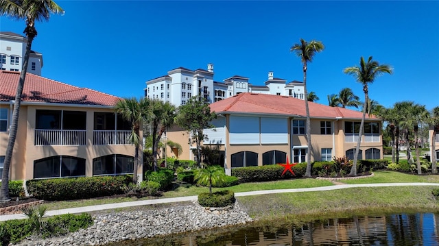 view of building exterior featuring a water view