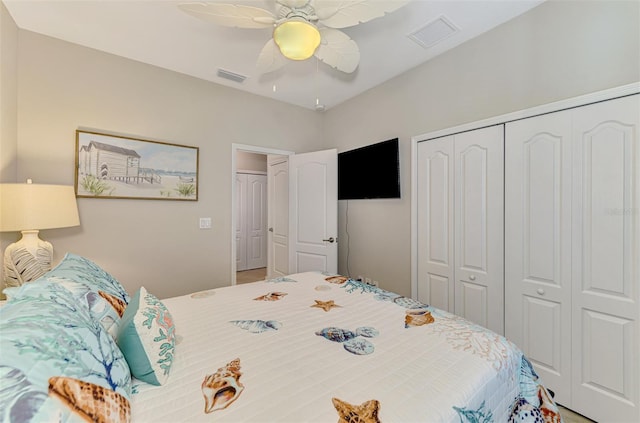 bedroom featuring a closet, visible vents, and ceiling fan