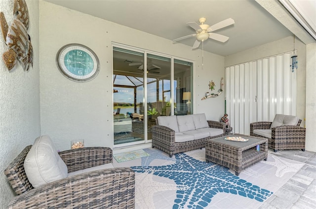 exterior space featuring a ceiling fan