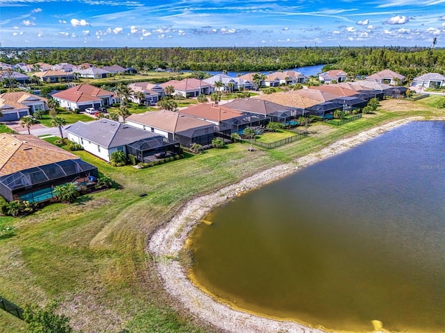 aerial view with a water view and a residential view