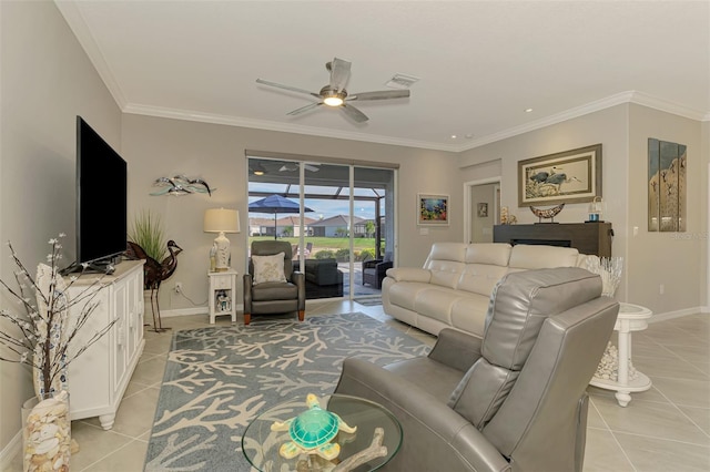 living room with baseboards, visible vents, ornamental molding, and light tile patterned flooring