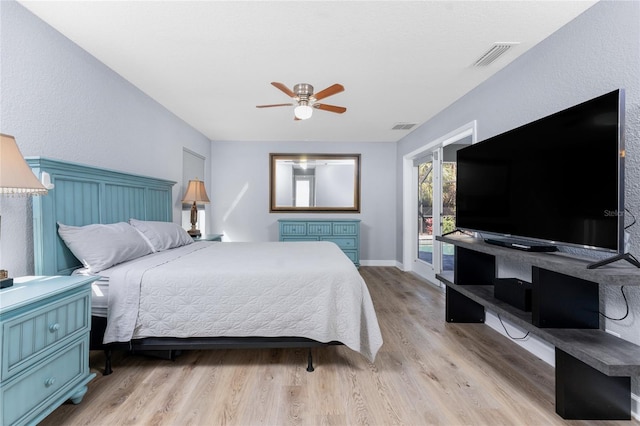 bedroom featuring visible vents, light wood-style flooring, a ceiling fan, access to outside, and baseboards