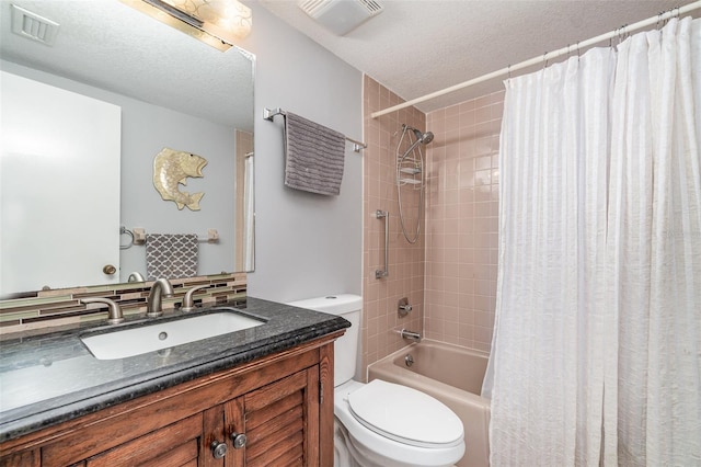 full bath featuring shower / bath combination with curtain, visible vents, a textured ceiling, and toilet