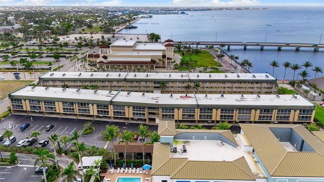 birds eye view of property featuring a water view