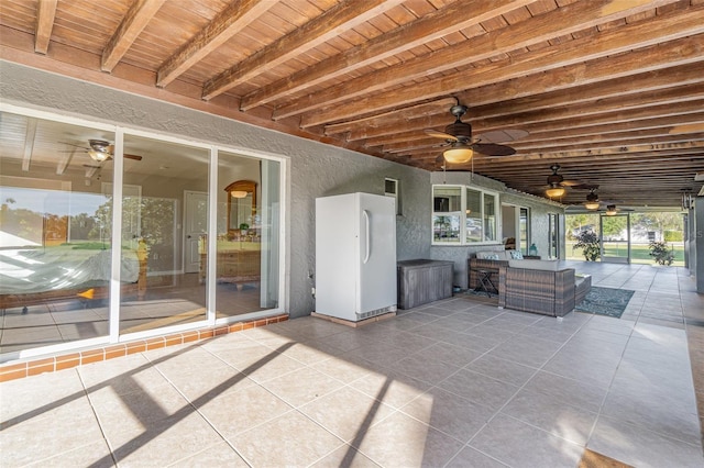 view of patio with ceiling fan