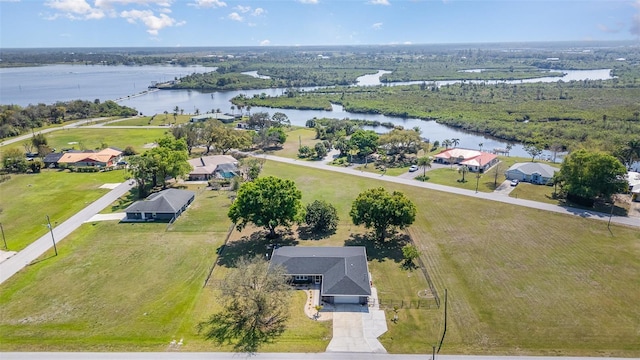 bird's eye view with a water view