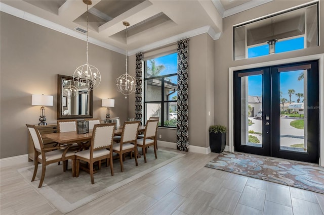 dining room featuring coffered ceiling, a towering ceiling, visible vents, baseboards, and ornamental molding