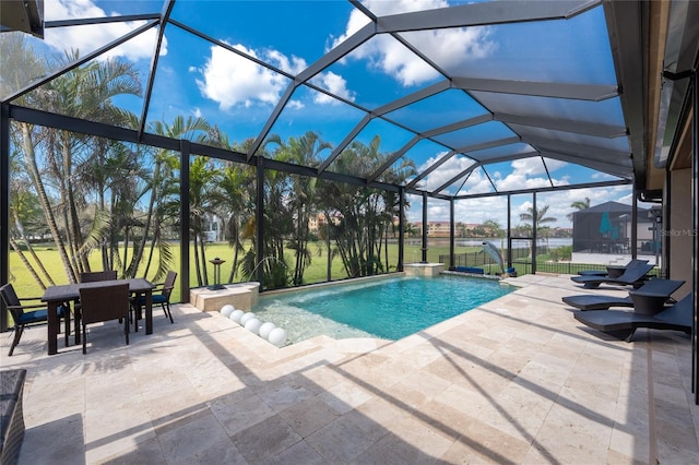 pool featuring outdoor dining space, a lawn, a patio area, and a lanai